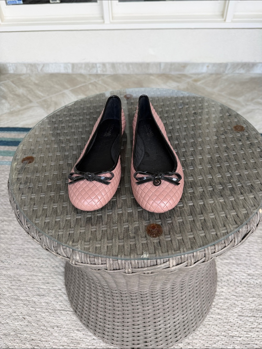 MICHAEL Michael Kors Quilted Pink Ballet Flats with Black Bow Accent